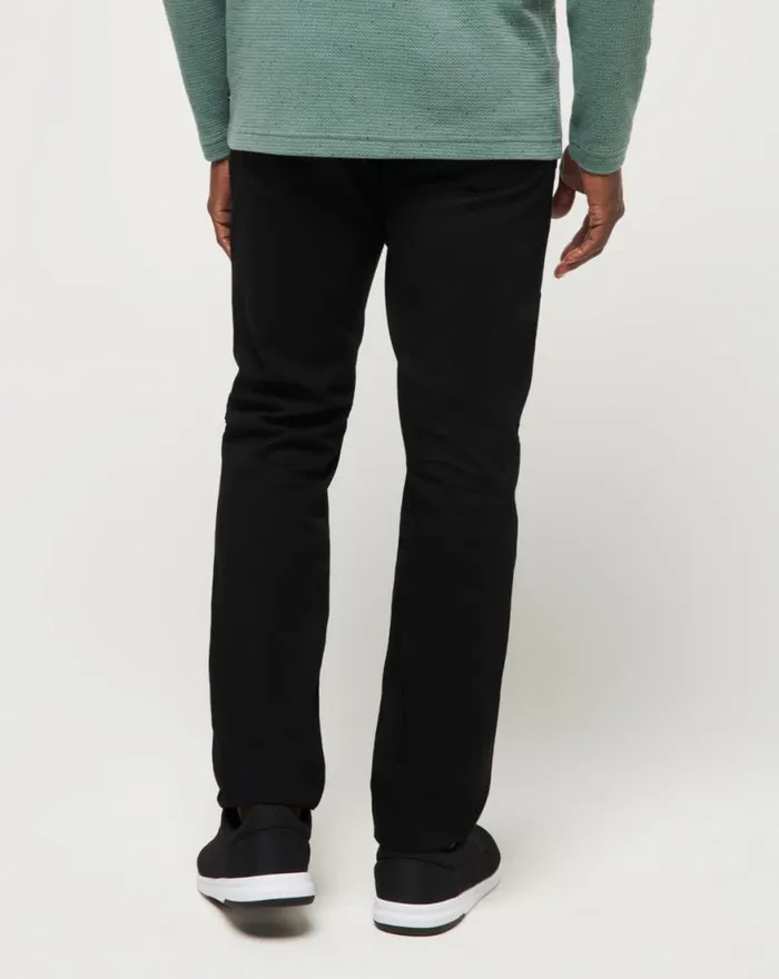 Men LEGACY FEATHERWEIGHT JEANS Black TravisMathew Jeans