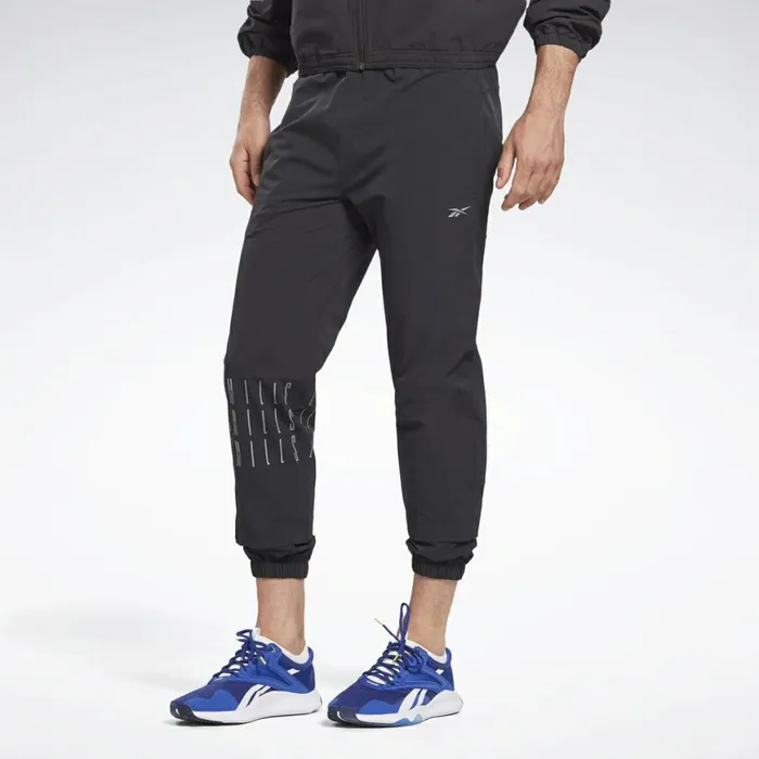Pants MensWomens Reebok LES MILLS Woven Pants Black