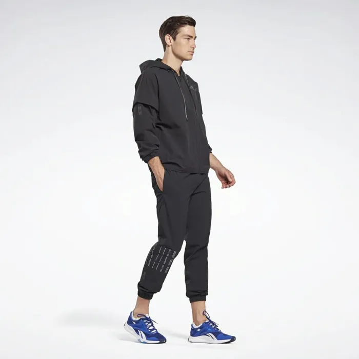 Pants MensWomens Reebok LES MILLS Woven Pants Black