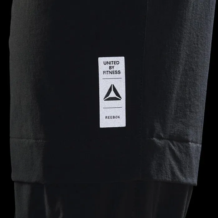 Pants MensWomens Reebok LES MILLS Woven Pants Black