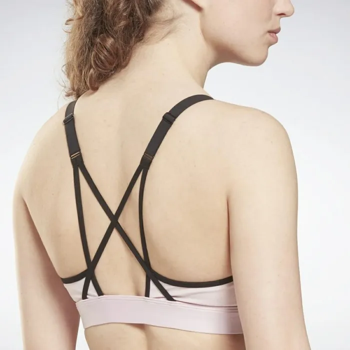 Sports Bras Womens Reebok Lux Strappy MediumImpact Sports Bra Frost Berry