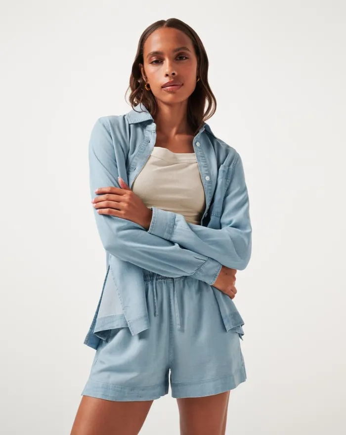 Women CHAMBRAY BUTTON DOWN LONG SLEEVE Light Wash TravisMathew Shirts and Tops Women CHAMBRAY BUTTON DOWN LONG SLEEVE Light Wash TravisMathew Shirts and Tops