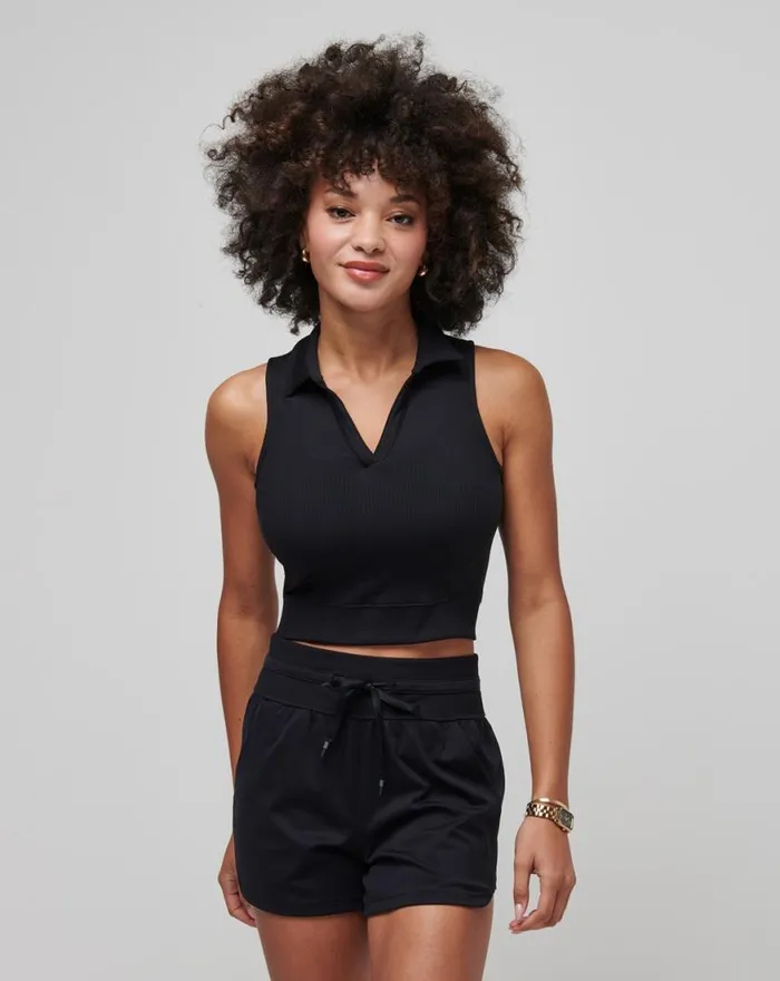 Women MOVEKNIT SLEEVELESS VNECK POLO Black TravisMathew Polos