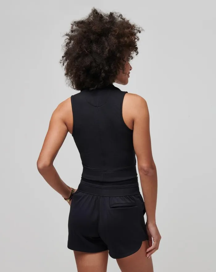 Women MOVEKNIT SLEEVELESS VNECK POLO Black TravisMathew Polos