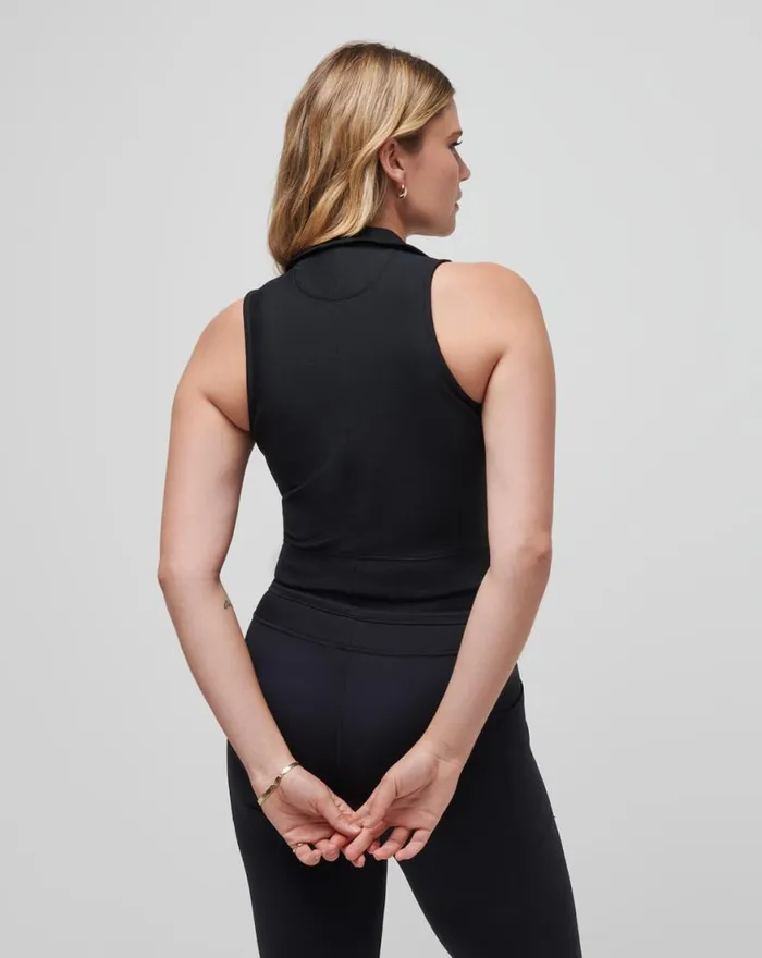 Women MOVEKNIT SLEEVELESS VNECK POLO Black TravisMathew Polos